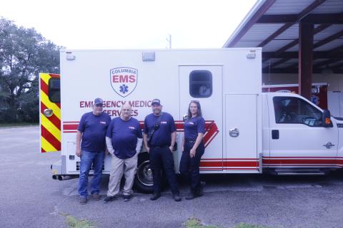 Columbia EMS, which will serve as Columbia County’s 911 emergency medical service provider starting Oct. 1, already has two trucks on the road. Among the Columbia EMS team are Toby Witt (from left), Mike Broshar, Aaron Smith and Cherie Lawrence. (JAMIE WACHTER/Lake City Reporter)