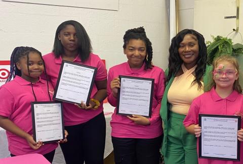 Young Women of Excellence members Lanashia Peterson (from left), Janaisha Peterson, Graciela Gerard, Mrs. Thayla Mullins (Assistant Principal, Lake City Middle School), and Bonnie McKerley pose for a photograph following a recent event. (COURTESY)