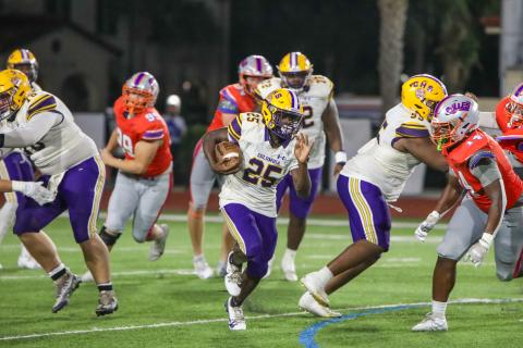 Columbia running back Jerome Horne runs for a big gain against Bolles on Friday. (BRENT KUYKENDALL/Lake City Reporter)