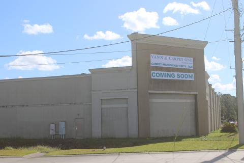 Vann Carpet One has purchased the old Ashley Furniture building across from Publix. The longtime Lake City business plans to consolidate its two downtown locations into the new location early next year. (TONY BRITT/Lake City Reporter)