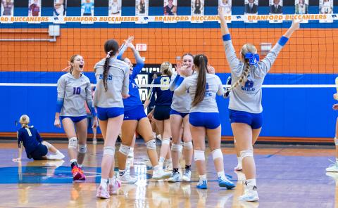 The Branford Buccaneers celebrate after scoring a point against Aucilla Christian in the Region 3-R semifinals on Saturday. (JACK HOWDESHELL/Lake City Reporter)