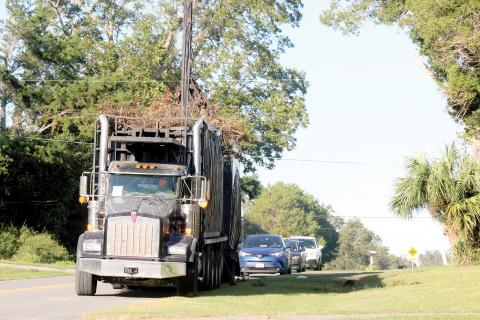 Columbia County crews and contractors are continuing to pick up debris from Hurricane Helene, already gathering as much as from Idalia a year ago. (JAMIE WACHTER/Lake City Reporter)