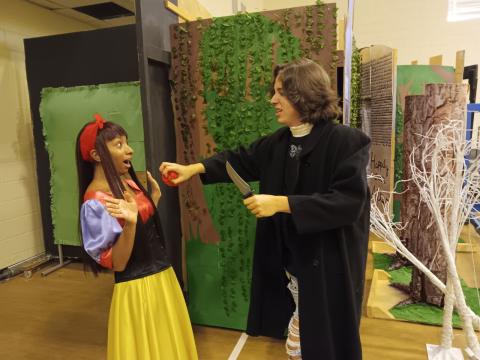 Asher Watson pulls the heart out of Gelissa Howard, who is portraying Snow White, in the Snow White room of the Columbia High theatre department’s haunted house of ‘The Real Grimm’s Fairytales.’ (TONY BRITT/Lake City Reporter)