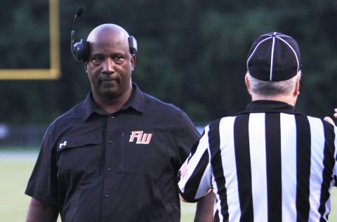 Fort White head coach Demetric Jackson stares at a referee during a game against Fernandina Beach on Sept. 13. (PAUL BUCHANAN/Lake City Reporter)