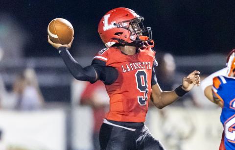 Lafayette quarterback Tywan Williamson throws a pass against Branford on Oct. 14. (JACK HOWDESHELL/Lake City Reporter)