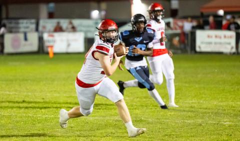 Lafayette receiver Tucker Higginbothom turns up field after catching a pass against Zarephath Academy on Sept. 20. (JACK HOWDESHELL/Lake City Reporter)
