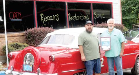 Sherm’s Auto Repair and Restoration was nominated previously for the Guide to Florida Best of Florida award for best auto repair center, but this year’s award was the first time it has captured the honor. Sherman Stanley, the repair shop owner, pictured with his son, Tre’s Stanley, said it is big recognition. (TONY BRITT/Lake City Reporter)
