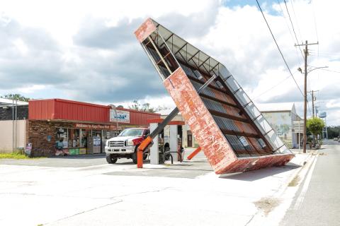 The canopy over the gas pumps at the Mayo Food Mart on W. Main Street was toppled by the winds during Hurricane Helene. (JACK HOWDESHELL/Lake City Reporter)