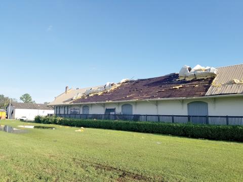 The roof on the 1903 Atlantic Coast Line Freight Station, which houses the Suwannee County Historical Museum, was peeled off during Hurricane Helene. Crews have already done a temporary fix on the roof to protect the artifacts and displays inside the museum. (COURTESY ERIC MUSGROVE)