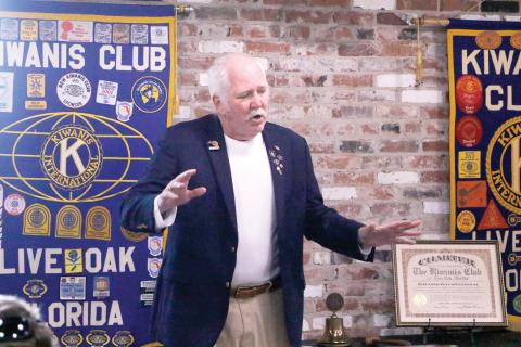 Kiwanis Club of Live Oak member Brantly Helvenston IV talks about the history of the club, which is celebrating its 100th year, during a celebration Friday at Heritage Park and Gardens. Helvenston’s grandfather and great-uncle were among the founding members. (JAMIE WACHTER/Lake City Reporter)