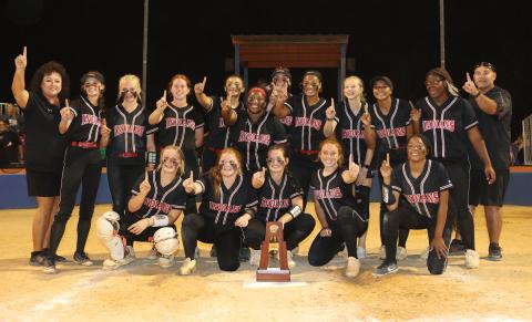 Fort White head coach Michelle Padgett (far left) and assistant coach Chad Padgett (far right) officially resigned from their positions Tuesday after 12 seasons as the helm. (FILE)