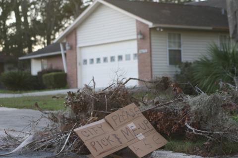 A pile of debris left over from Hurricane Helene awaits pickup. (TONY BRITT/Lake City Reporter)