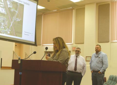 Debi Bennefield (left) speaks during Thursday’s county meeting alongside County Manager David Kraus and Lake City Executive Director of Utilities Steve Brown. (TONY BRITT/Lake City Reporter)