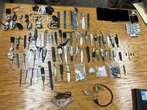 The contraband collected during an unannounced sweep at Suwannee Correctional Institution included 50 weapons as well as drugs, alcohol and phones. (COURTESY FLORIDA DEPARTMENT OF CORRECTIONS)