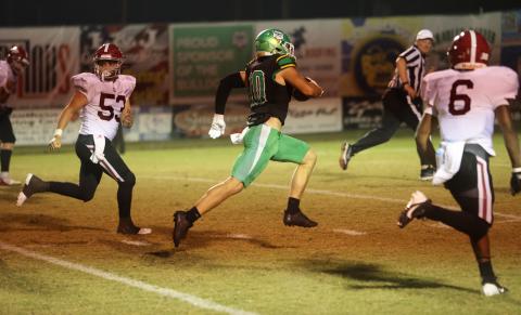 Suwannee safety Koy Frier returns an interception for a touchdown against Chiles last Friday. (PAUL BUCHANAN/Lake City Reporter)