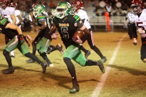 Suwannee receiver MJ Rossin runs up field against Chiles last Friday. (PAUL BUCHANAN/Lake City Reporter)