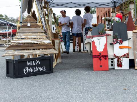 Handmade Christmas crafts adorn a booth at a previous Lafayette County Christmas festival around the courthouse square. The Mayo Christmas Market is set for 10 a.m. to 5 p.m. Saturday. (FILE)