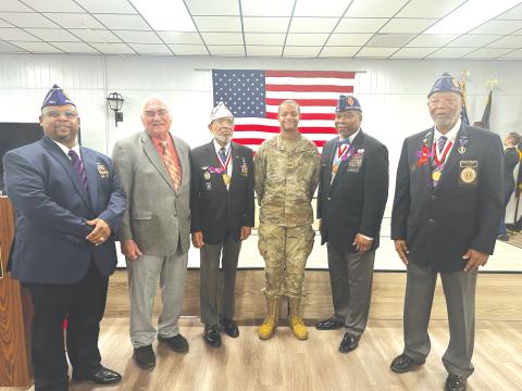 Command Officer Walker, Mayor Witt, Commanding Sergeant Major Smith, Minuteman Scholarship and Army Reserve Cadet Victoria Coker, Command Sergeant Major Walden, and Sgt. Bolden participated in an Our Community Cares Coalition event designating several local cities, towns and counties as Purple Heart Communities. (COURTESY)