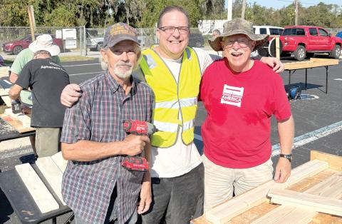 Robert Stuart (from left), Christopher Costello and Rick Fortney helped build 22 new beds for Columbia County children who don’t have one. (COURTESY)