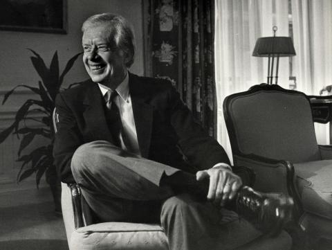 Jimmy Carter, smiling during a 1986 interview at the St. Regis Hotel in New York, died Sunday. He was 100.  (ED HILLE/TNS)