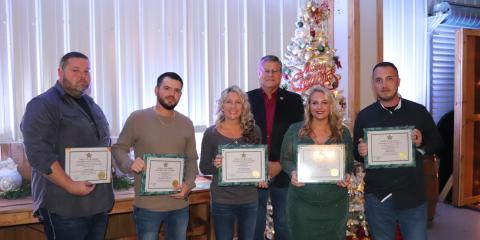 Honored for their work with the Columbia County Sheriff’s Office in 2024 at the agency’s annual Christmas party and awards ceremony were Lt. Ronnie Daniels (from left), Dale Tanksley (Detention Officer of the Year), Hope Crawford (Non-Sworn Employee of the Year), Sheriff Mark Hunter, Jennier Cason (Detective of the Year) and Michael Rooney (Deputy of the Year). Not pictured are Skip Bunner (Volunteer of the Year) and Cathy Davis, who also were recognized. (COURTESY COLUMBIA COUNTY SHERIFF'S OFFICE)