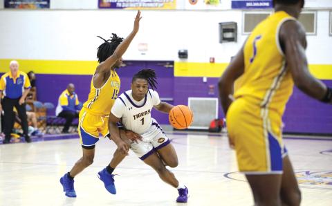 Columbia guard Zamarion Jones drives to the paint during last week’s game against Palatka. Jones and other veteran players will have to step up with forward Jalen Gaskins out for the remainder of the season. (BRENT KUYKENDALL/Lake City Reporter)
