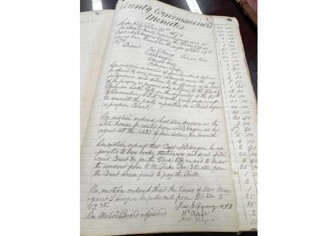 Minutes from the Dec. 21, 1874, Columbia County Commission meeting show the county offered a $5,000 reward for the capture and conviction of whoever burned down the courthouse the previeous day. Nobody was ever charged with the crime. (JAMIE WACHTER/Lake City Reporter)