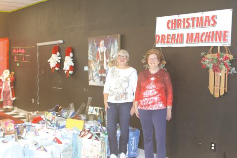Meally Jenkins (from left), Christmas Dream Machine founder and director and Janet Stanford, Christmas Dream Machine treasurer and secretary, helped collect toys for 670 kids for Christmas this year. (FILE)