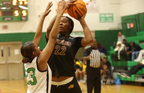 Columbia forward Dariyan Williams tries to get a shot off against Suwannee on Nov. 22. (PAUL BUCHANAN/Lake City Reporter)