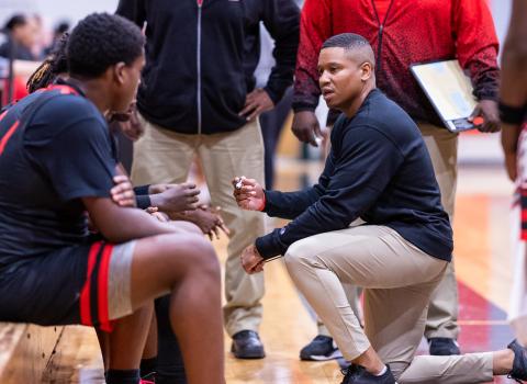 Fort White coach Elven Sheppard talks to his team in a timeout during a game against Lafayette on Dec. 5. (JACK HOWDESHELL/Lake City Reporter)