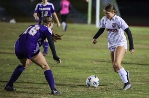 Lafayette's Carra Clark tries to get past Columba's Jenavieve Farer on Dec. 2. (BRENT KUYKENDALL/Lake City Reporter)