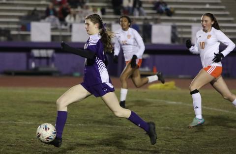 Columbia's Niki Sossie dribbles the ball up the field against Orange Park on Jan. 9. (BRENT KUYKENDALL/Lake City Reporter)