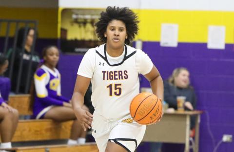 Columbia forward Jolena Gardner dribbles the ball up the court during a game against Rickards on Jan. 16. (BRENT KUYKENDALL/Lake City Reporter)