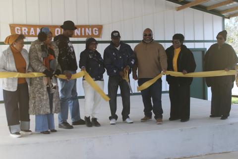 Members of the Annie Mattox Park board cut the ribbon during a grand opening for the Annie Mattox Park pavilion on Monday afternoon. (TONY BRITT/Lake City Reporter)