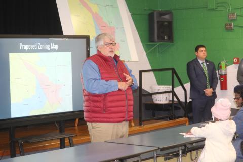 Superintendent Keith Couey discusses the new zoning proposal at a town hall meeting Tuesday at Five Points Elementary. (TONY BRITT/Lake City Reporter)