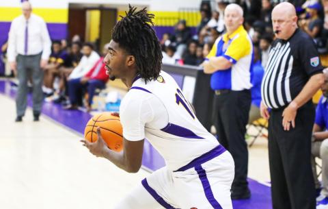 Columbia forward Zavian Douglas looks to pass against Palatka on Dec. 18. (BRENT KUYKENDALL/Lake City Reporter)