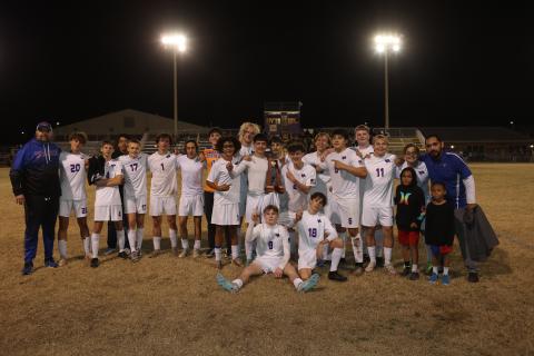 The Branford boys soccer team celebrates with the District 2-2A trophy after defeating Bell 3-2 on Thursday. (PAUL BUCHANAN/Lake City Reporter)