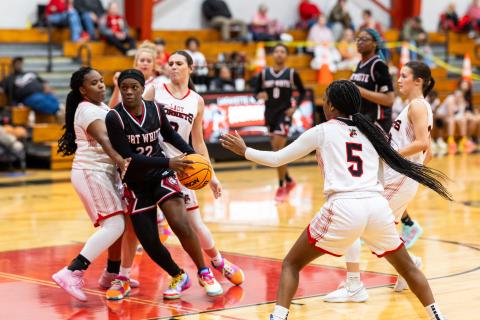 Fort White guard Zuri Hollie drives through the Lafayette defense on Tuesday night. (JACK HOWDESHELL/Lake City Reporter)