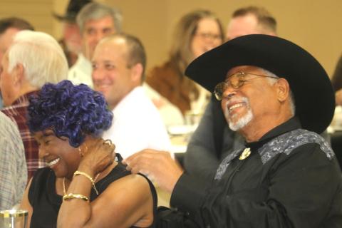 Ron and Gwendolyn Williams laugh during Thursday’s retirement celebration in honor of Ron Williams’ 43 years as a county commissioner. (TONY BRITT/Lake City Reporter)