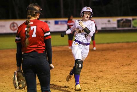 Columbia second baseman Anna Dansby rounds third base after Emily Delgado hit a home run against Baker County on Thursday night. (BRENT KUYKENDALL/Lake City Reporter)