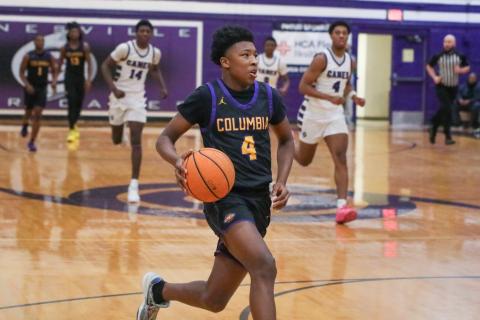 Columbia guard Shaheed White drives to the basket on a fast break against Gainesville on Jan. 23. (BRENT KUYKENDALL/Lake City Reporter)