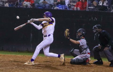 Columbia outfielder Bynton Edge hits a single against Santa Fe on Tuesday night. (BRENT KUYKENDALL/Lake City Reporter)