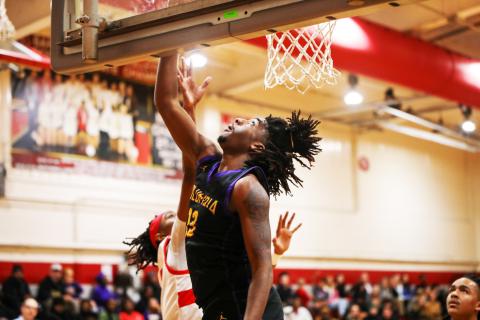 Columbia forward Zavian Douglas makes a layup against Santa Fe on Jan. 24. (BRENT KUYKENDALL/Lake City Reporter)