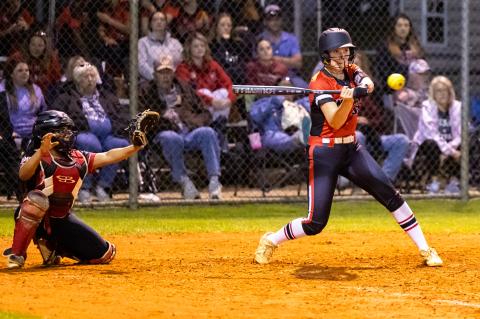 Fort White's Sydnee Mills swings at a pitch against Hamilton County on Tuesday night. (JACK HOWDESHELL/Lake City Reporter)