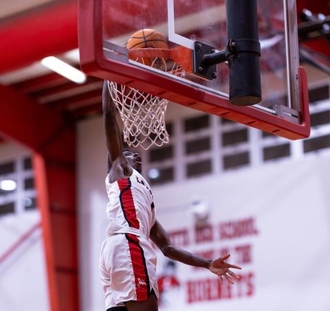 Lafayette guard Jordan Murphy dunks against Fort White on Dec. 5, 2024. (JACK HOWDESHELL/Lake City Reporter)