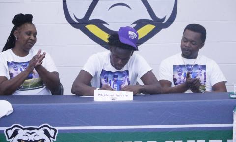 Suwannee receiver MJ Rossin signs his letter of intent to play collegiately at Western Carolina on Wednesday. (JAMIE WACHTER/Lake City Reporter)