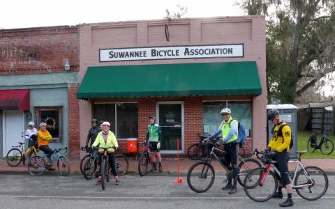 Cyclists congregate outside the Suwannee Bicycle Association headquarters in White Springs ahead of the 2023 Suwannee Sweetheart Cycling Weekend. (COURTESY)