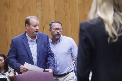 Hamilton County Clerk of Court Greg Godwin, talking with Rep. Jason Shoaf ahead of Monday’s delegation hearing, told the legislators that the courtroom would look different before they return thanks to state funding for renovations. (JAMIE WACHTER/Lake City Reporter)