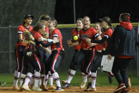 Fort White's softball team celebrates after defeating Columbia 4-3 on Wednesday night. (BRENT KUYKENDALL/Lake City Reporter)