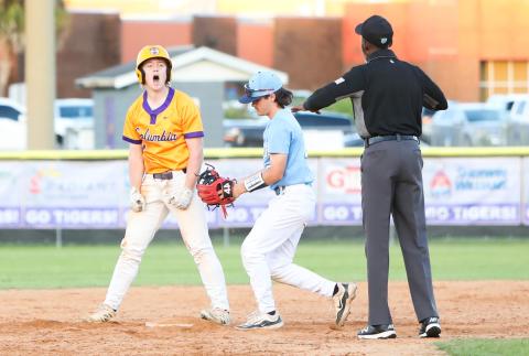 Columbia right fielder Trayce McKenzie celebrates at second base after hitting an RBI double against St. Johns Country Day on Tuesday. (BRENT KUYKENDALL/Lake City Reporter)